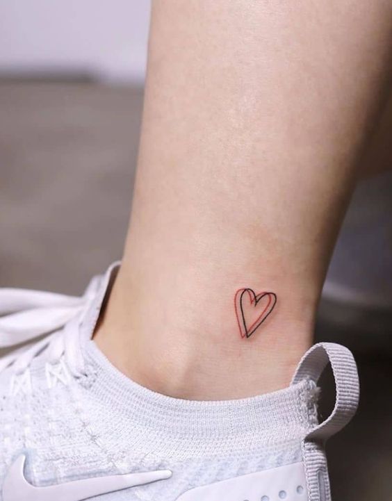 little heart tattoo on leg