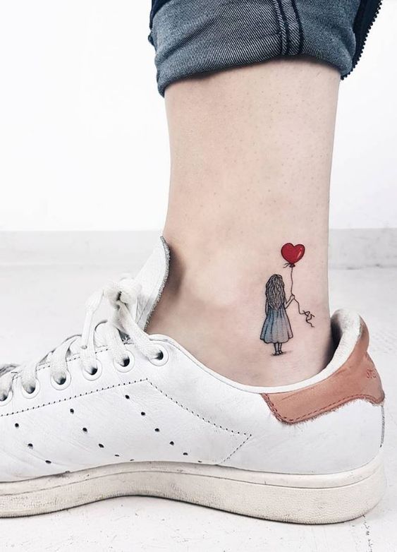 girl + Heat tattoo on foot