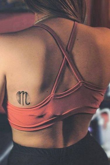 scorpio tattoo on girl back
