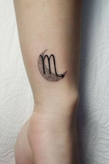 small leo Tattoo on wrist for girl