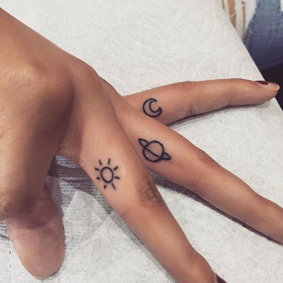 Small sun moon stars finger tattoo for female