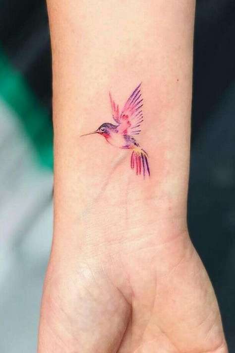 bird tattoo on wrist for girls