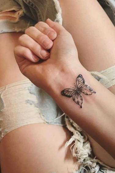 butterfly wrist tattoo for girls