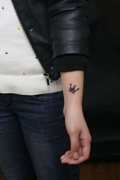crown tattoo on wrist for girls