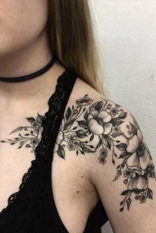 black floral shoulder cap tattoo