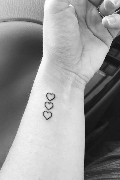 heart tattoo on wrist for females