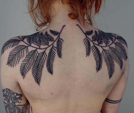 shoulder tattoos black flowers