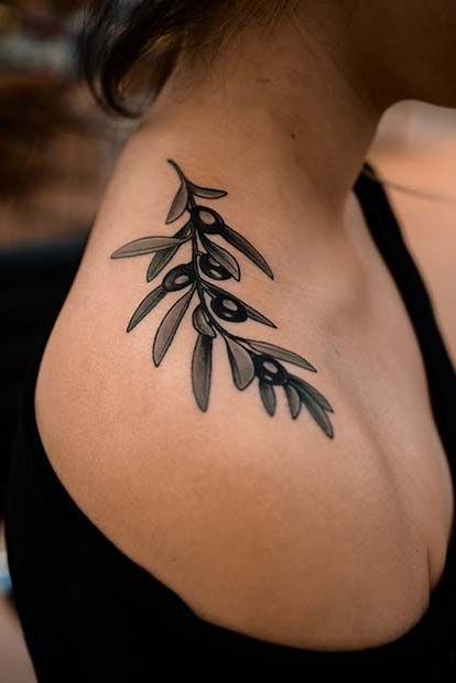 black shoulder tattoos flowers