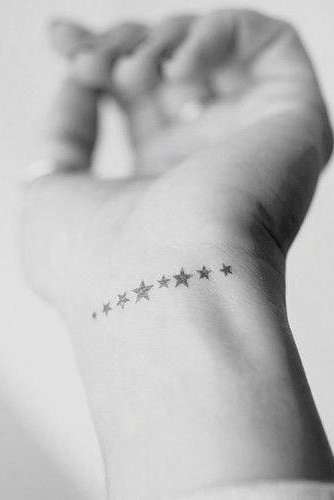 small star tattoo on wrist
