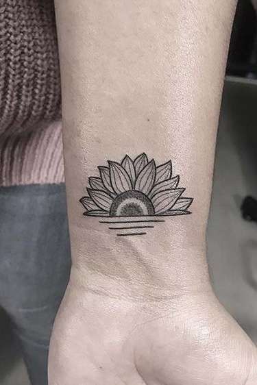 black sunflower wrist tattoo for girls