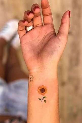 sunflower wrist tattoo for girls