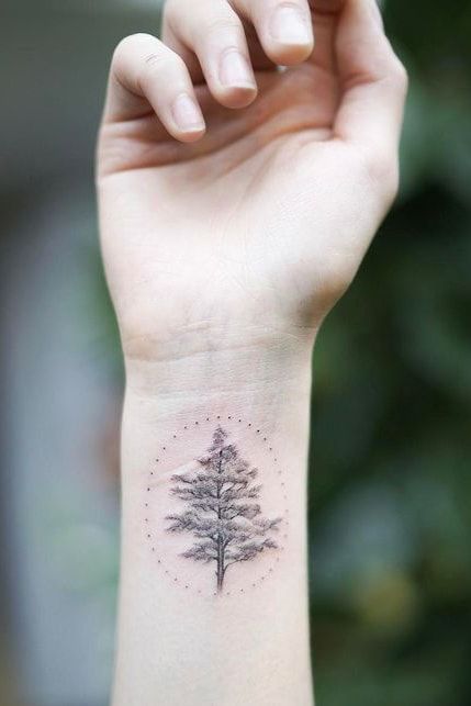 tree wrist tattoo for women