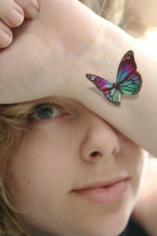 butterfly wrist tattoo for females