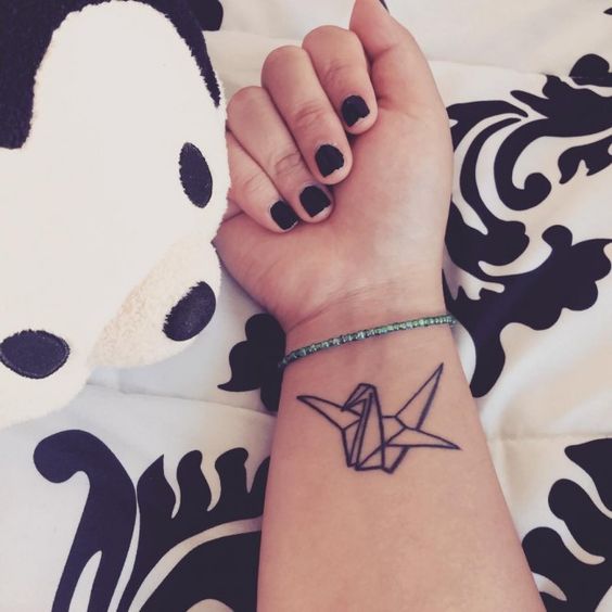 birds wrist tattoo for girl