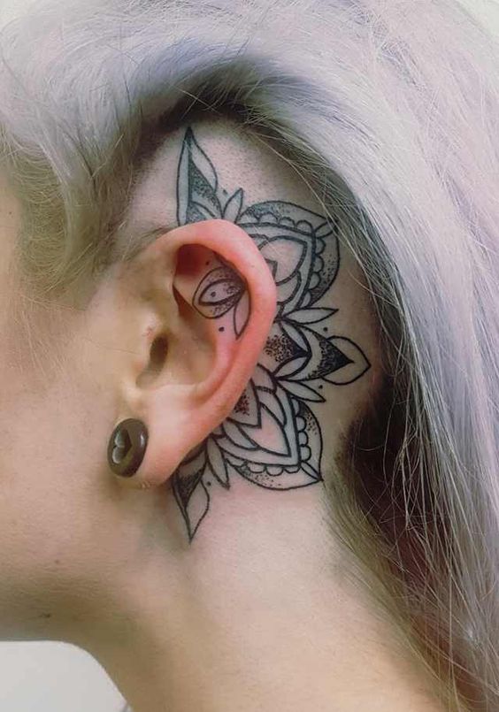behind ear head tattoo