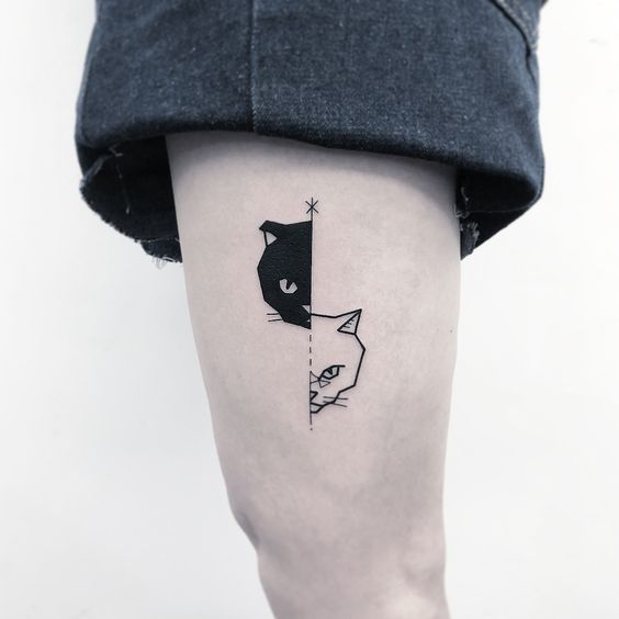 Cat Eye Tattoo on thigh