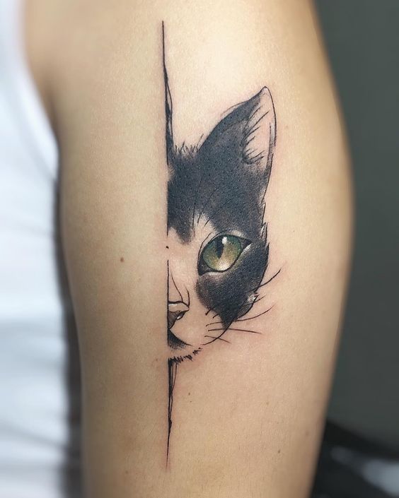 Cat Eye Tattoo on arm
