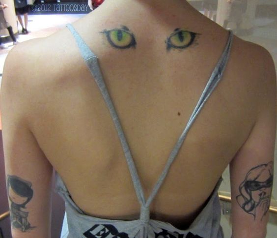 cat face tattoo back