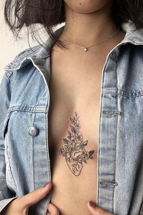 girl under chest tattoos