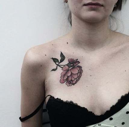 rose chest tattoo female