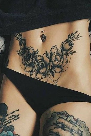 flower stomach tattoo for women
