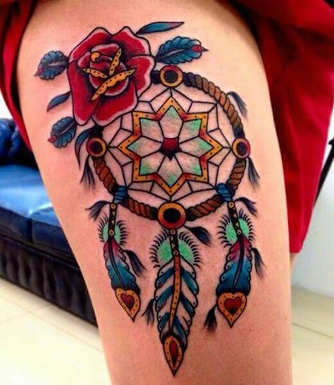 colorful dream catcher tattoo on thigh