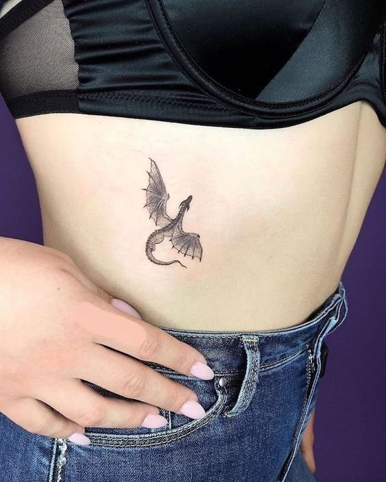dragon tattoo on rib