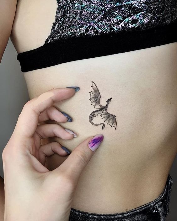rib dragon tattoo