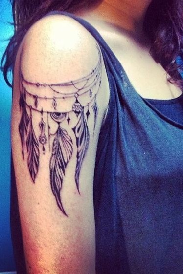 feather tattoo on shoulder