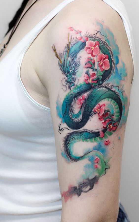 blue dragon tattoo on shoulder