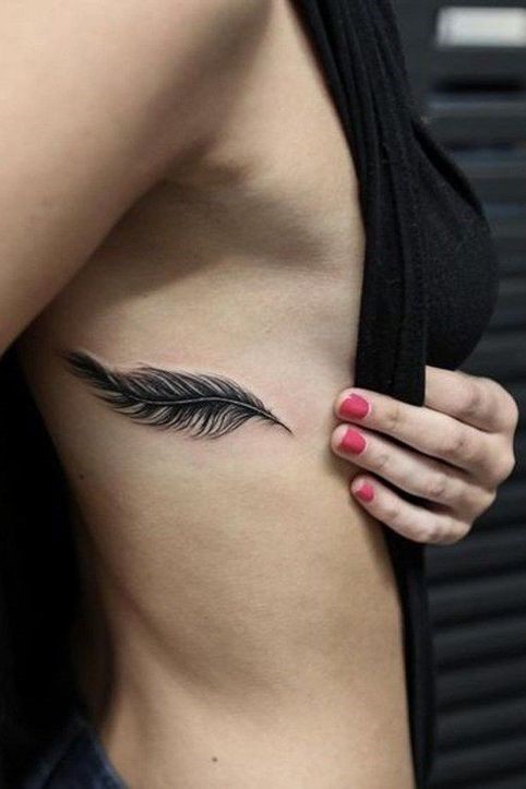 Rib feather tattoo design for women