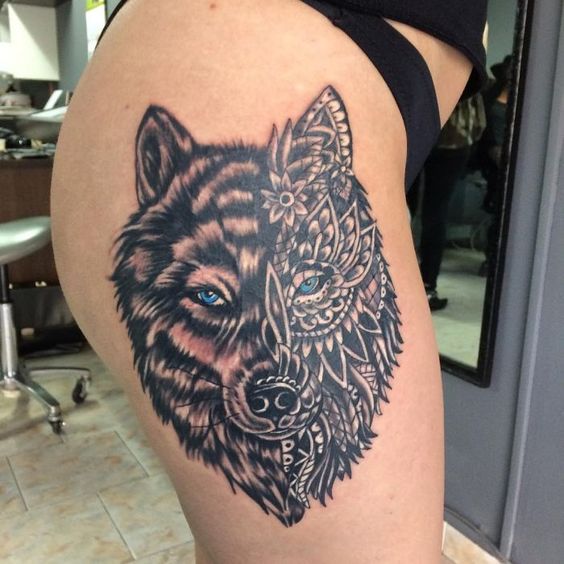 wolf tattoo on thigh