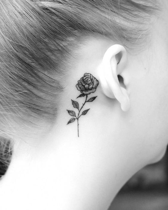 Rose tattoo behind ear