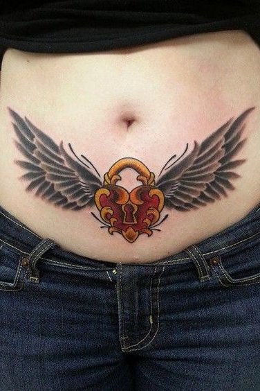 wings tattoo on stomach