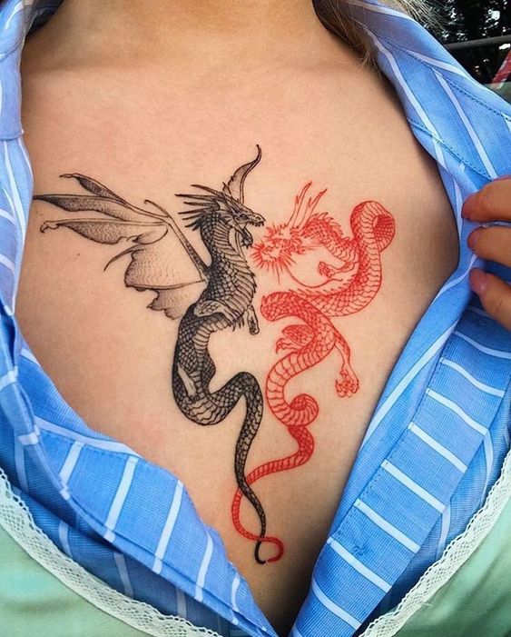 red & black dragon tattoo on chest