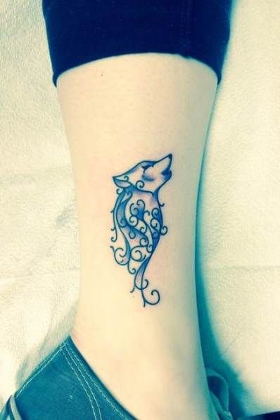 wolf tattoo on leg