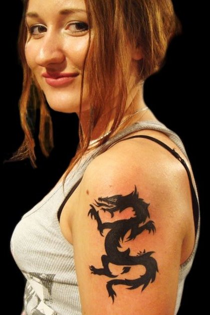 Dragon tattoo on shoulder