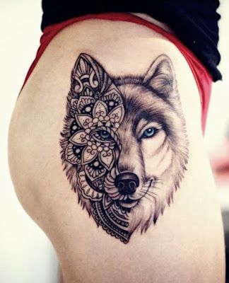 half face with flower wolf tattoo on thigh