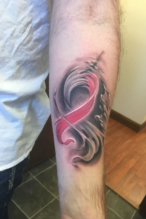 Cancer Ribbon Tattoo on Forearm