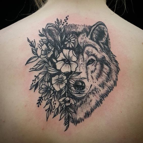 flower + wolf tattoo on back