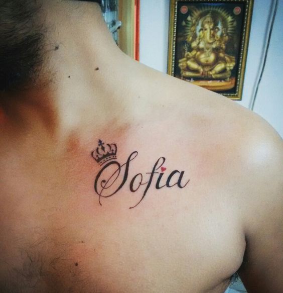 Name tattoo on chest for men