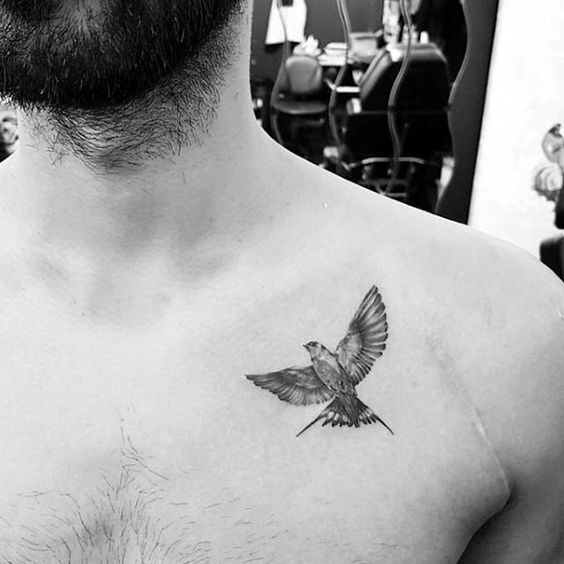 Small Tattoo on chest for men