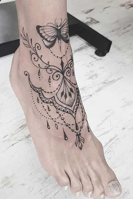 unique design tattoo on foot