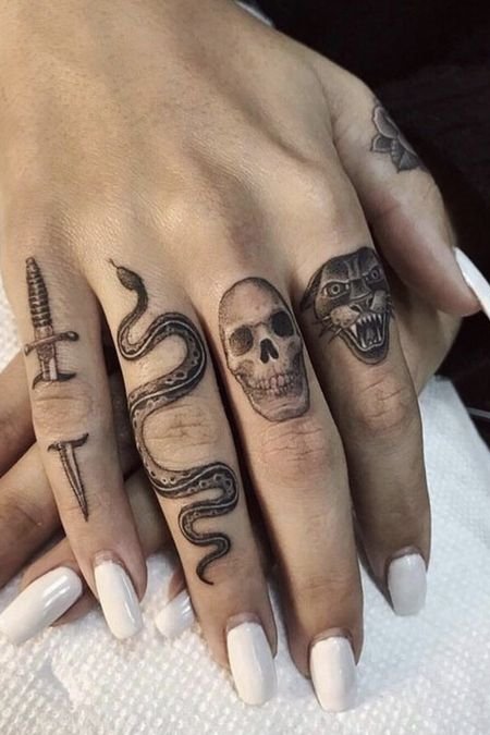 snake tattoo on finger