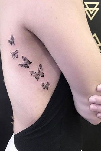 butterfly tattoo on rib