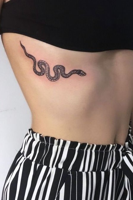 snake tattoo on rib