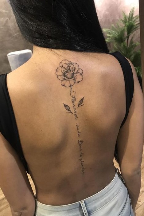 flower tattoo on back for females