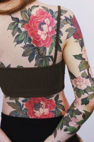 flower tattoo on back for females