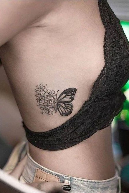 butterfly tattoo on rib