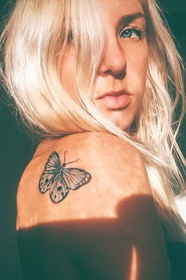 Butterfly tattoo on back